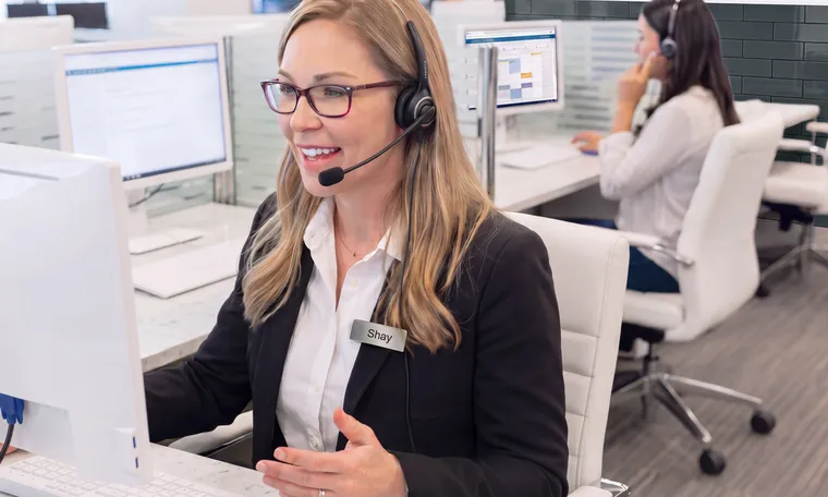 Ms. Shay Wells, Travel Concierge, on a call